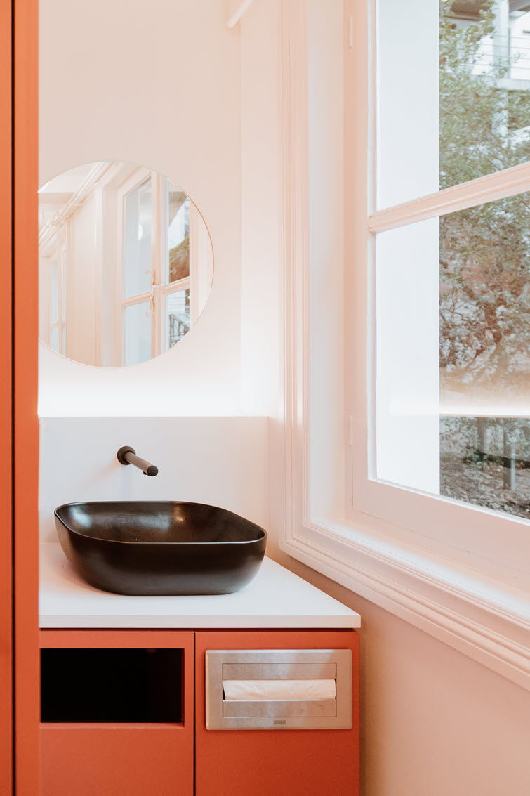 Sink with built-in waste bin in warm orange Baked Brick made of Unilin Panels material