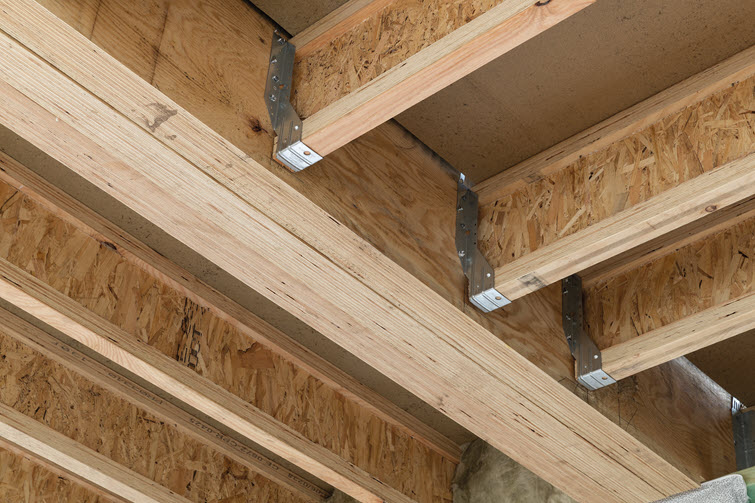 They chose I-Joist profiles, which are 50% lighter than solid wood, for the long spans.